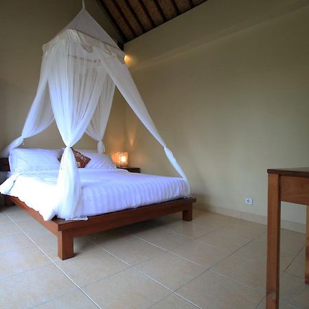 Tanggal Merah Guest House Ubud Esterno foto