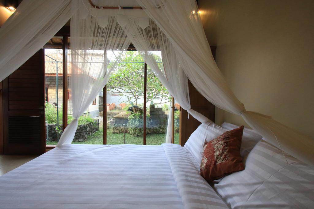 Tanggal Merah Guest House Ubud Esterno foto