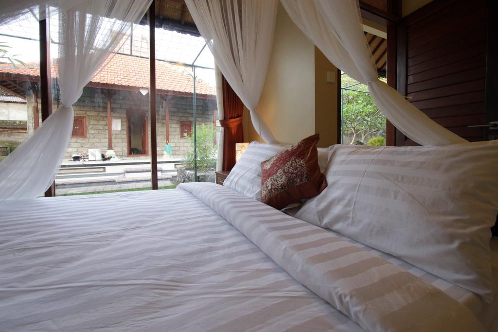Tanggal Merah Guest House Ubud Esterno foto