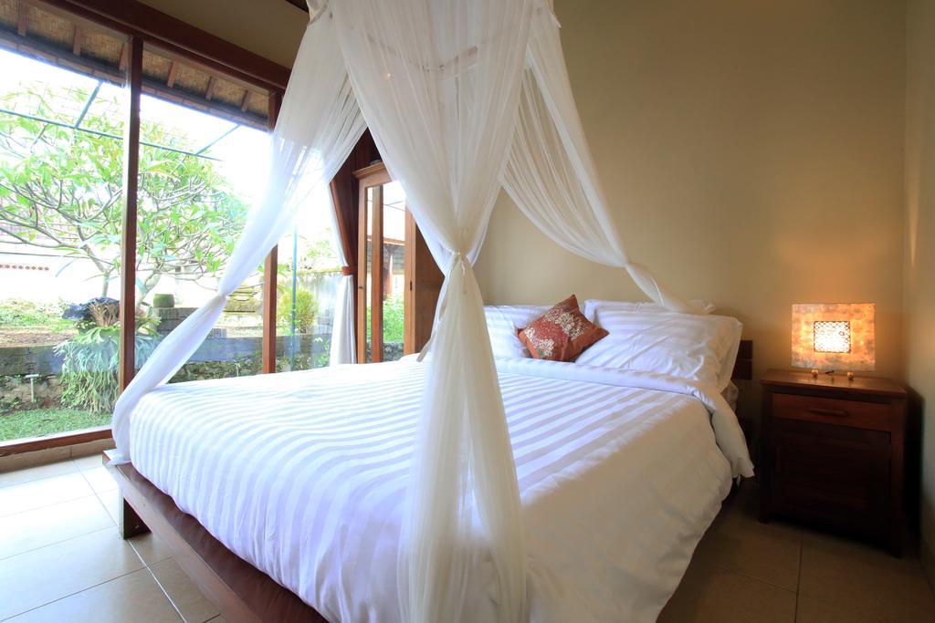 Tanggal Merah Guest House Ubud Esterno foto