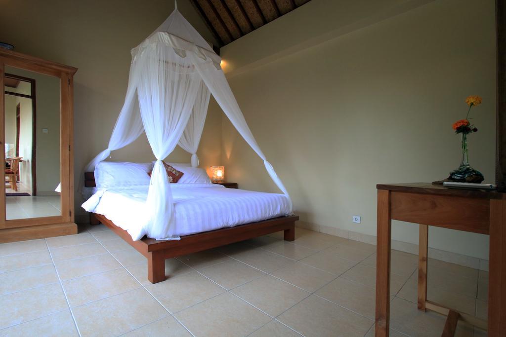 Tanggal Merah Guest House Ubud Esterno foto