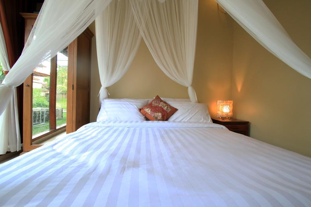Tanggal Merah Guest House Ubud Esterno foto