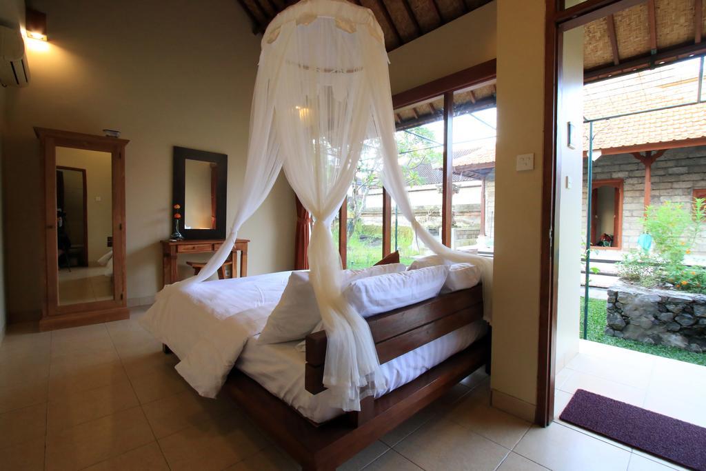 Tanggal Merah Guest House Ubud Esterno foto
