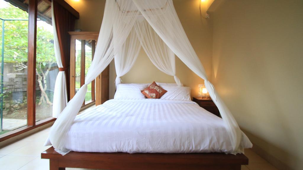 Tanggal Merah Guest House Ubud Esterno foto